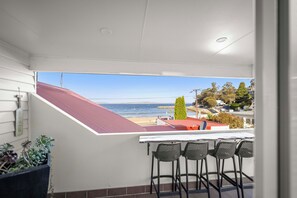 Furnished balcony with beach views (1)