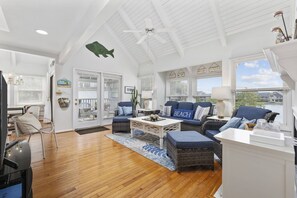 Living Area with access to covered deck!