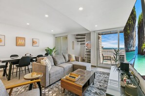 As you enter, you’ll be greeted by a chic, open-plan concept with a direct ocean view