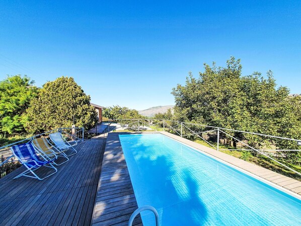 Water, Sky, Water Resources, Plant, Azure, Blue, Natural Landscape, Sunlight, Swimming Pool, Tree