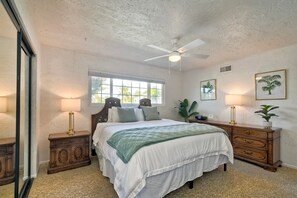 King sized bed featured in the primary bedroom