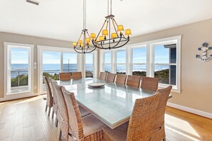 The Dining Area seats 14 and opens onto a spacious oceanfront sun deck, perfect for al fresco dining with a view.