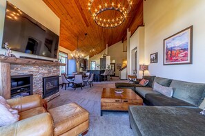 Open living room, dining room, and kitchen.