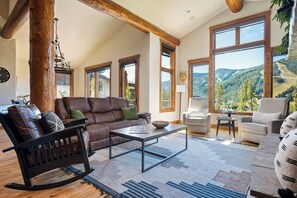 Floor to ceiling windows and vaulted ceilings