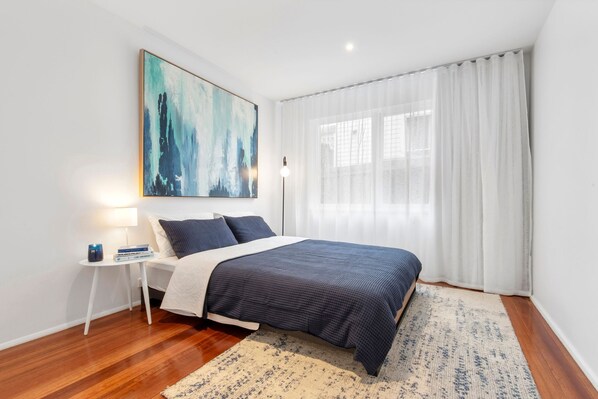 Queen bedroom, with built in robes and blockout blinds