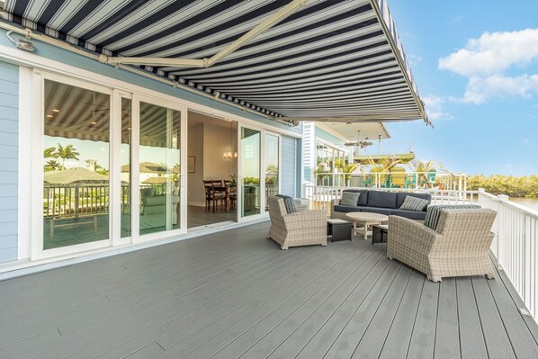 Relax on the large deck overtop the canal