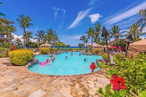 Enjoy a refreshing drink under the sunlit afternoon in our tropical lagoon pool with full-service food and drinks, provided poolside by Dukes.