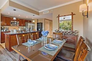 Dine in style at Honua Kai Konea 232 with a sleek table and seating perfect for shared meals.