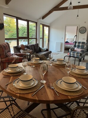 Living area, comfy sofa and reclining arm chairs