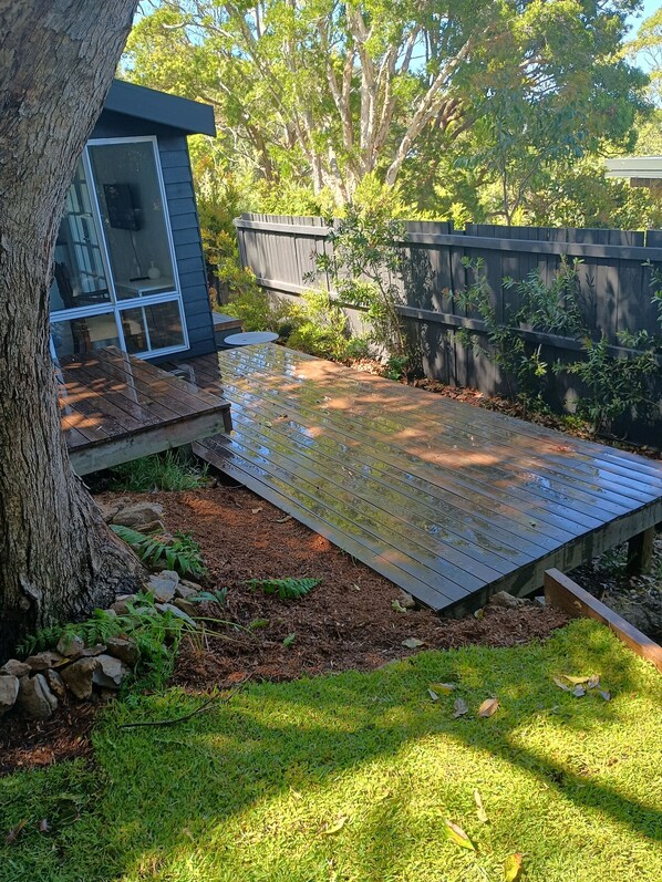 Private outdoor garden and deck for guests to enjoy.