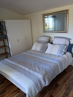 Queen Bed in Studio