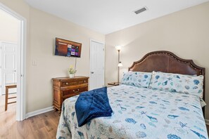 This stylish Second Bedroom offers easy access with doors from both the bedroom and living room 