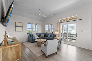 Top-Level Living Room with Deck Access