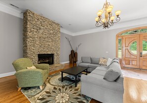Main level living room - comfy seating & TV.