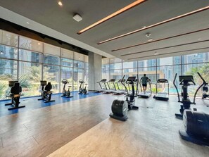 Fitness Studio: Get energized with modern equipment and stunning city views!