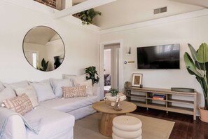 Living room with sleeper sofa and smart TV