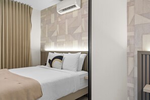 Unwind in this stylish and peaceful room.