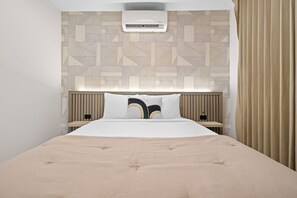 Unwind in our cozy and stylish room, perfect for a restful night's sleep.








