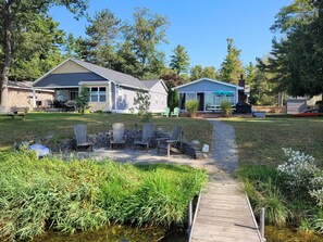OVERALL:  Looking back from the private dock on the bonfire ring and outdoor deck.