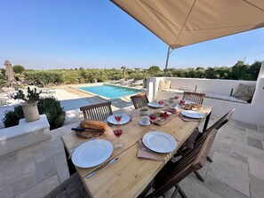 Dine Al Fresco by the pool and just look at  the view