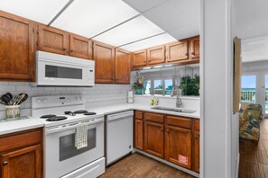 The fully equipped kitchen has everything you need to prepare meals for family and friends.