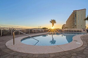 Enjoy a dip in the communal outdoor pool. 
