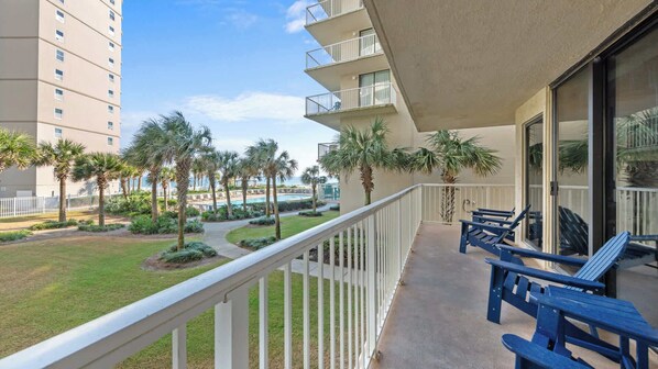 Take in the fresh air and enjoy a view of the water with this wrap-around balcony. 