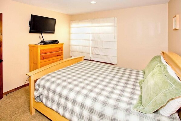 Master bedroom: King bed w/ TV