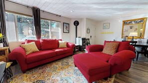 Modern living room with flat screen TV, pellet stove