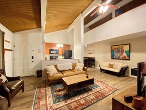Living room with Apple TV, DVD player, fireplace