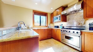 Fully equipped kitchen with stainless steel appliances