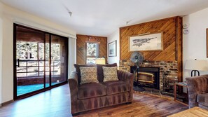 Newly remodeled living room w/ fireplace and flat screen TV