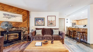 Newly remodeled living room w/ fireplace and flat screen TV