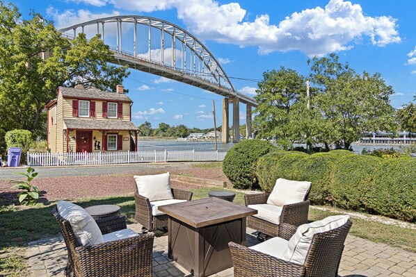 Welcome to your lovely patio with water views, fire it and blackstone Grill