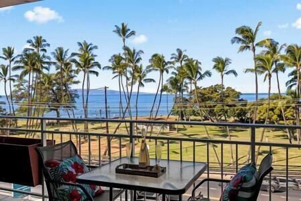 Watch the waves from your private lanai dinging table