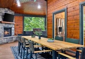 Gather around this spacious dining table, perfect for family dinners, game nights, or simply sharing stories by the fireplace.