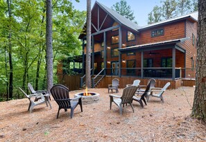 The outdoor fire pit area is perfect for roasting marshmallows, sharing stories, and gazing at the stars under the open sky.