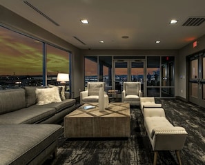 Embrace comfort on the plush sectional sofa, perfect for cozy evenings.