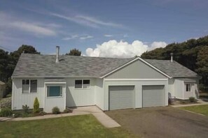 1366 SW Alicia Ln is on the left side of the garage. 
