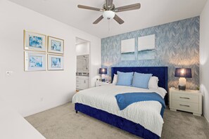Stylish and cozy bedroom with all the amenities for a comfortable stay.
