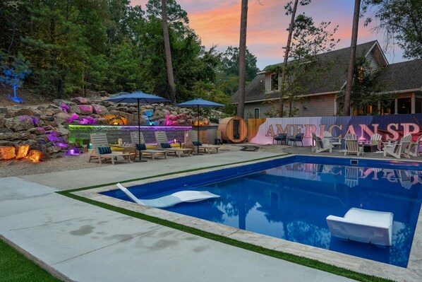 Embracing the tranquil beauty of dawn by the pool.