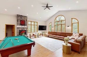Large Living Room located on 2FL with Billiards Table, Fireplace, and Smart TV