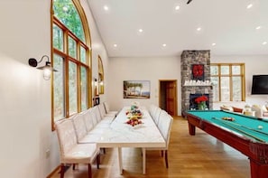 Large Dining Table fits 20 people with Billiards Table, Fireplace, and Smart TV