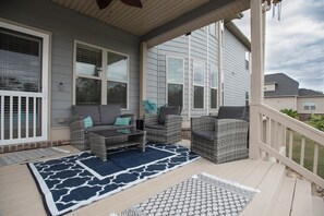 back porch. seating and grilling deck