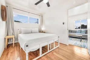 A Cozy Retreat: Relax and Unwind in Our Charming Bedroom. Primary bedroom has a queen size bed. 