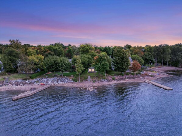 As the sun sets, our waterfront transforms into a canvas of twilight hues