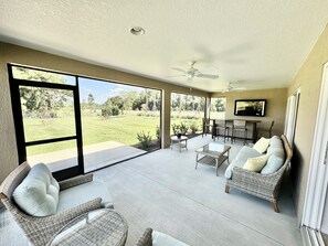 Screened-in Lanai with Bar and Flatscreen TV, Overlooking a Vast Backyard