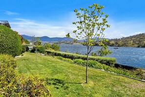 Garden leads down to the walking track and waters edge