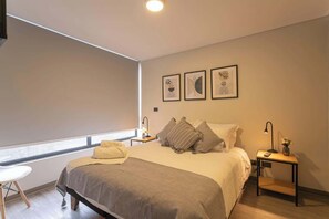 Dormitorio con encanto y un toque reparador.