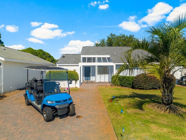 6 Seat Golf Cart & Front of Home